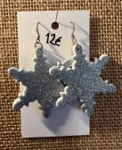 Hopeiset lumihiutaleet kimallesoftiksesta