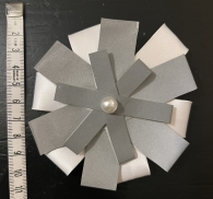 Heijastava rintakoru